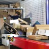  Halbautomatisierte Entladung: Körber setzt neue Maßstäbe in der Paketlogistik