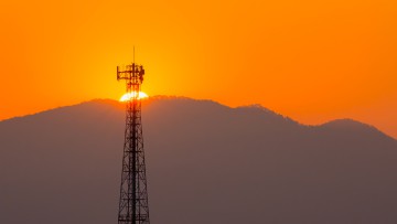 Handymast im Sonnenuntergang