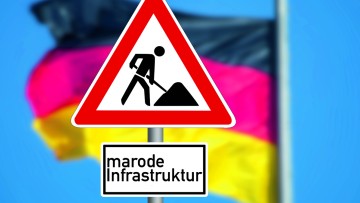 Baustellenschild mit dem Untertitel "marode Infrastruktur"