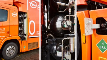Ein orangefarbener Brennstoffzellen-Lkw mit Detailansicht der Tanks