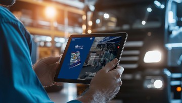 Webseite des Nutzfahrzeug-Report 2025 auf dem Tablet