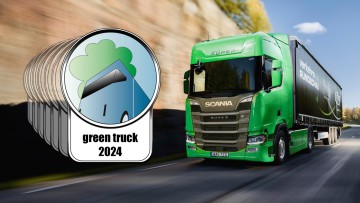 Grüner Scania 460 R und Green Truck Award Logo