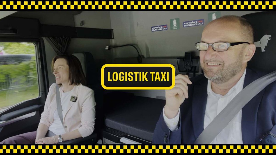 Anja Ludwig Kravag mit Gerhard Grünig im VR-Logistik-Taxi